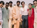 Shah Rukh Khan, Vijay Sethupathi, Anirudh Ravinchander, and Atlee Kumar with the newlyweds.