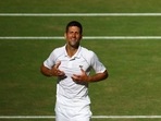 Serbia's Novak Djokovic celebrates after winning the men's singles final against Australia's Nick Kyrgios