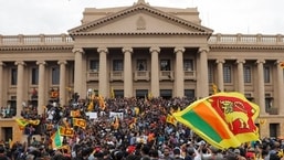 Demonstrators protest inside the presidential secretariat building after President Gotabaya Rajapaksa fled amid the country's economic crisis in Colombo, Sri Lanka.