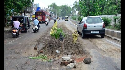 The portion of the road which caved in at Vishwakarma Chowk in Ludhiana. (Harvinder SIngh/HT)