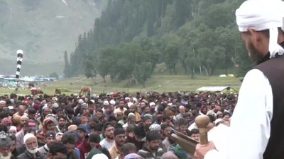 Members of Muslim community, who are offering services to pilgrims during Amarnath yatra, offered namaz at Baltal Base Camp on the occasion of Eid-ul-Adha. They also held a special prayer for those who lost their lives in the cloudburst. (ANI)