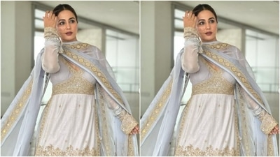 Hina styled her shoulder-length tresses into a clean bun with a middle part and left a few tresses open around her face as she posed for the pictures. (Instagram/@realhinakhan)