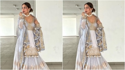 Hina opted for a minimal makeup look to complement her festive attire. In silver eyeshadow, black eyeliner, black kohl, mascara-laden eyelashes, drawn eyebrows, contoured cheeks and a shade of berry red lipstick, she made fashion traffic come to a standstill. (Instagram/@realhinakhan)
