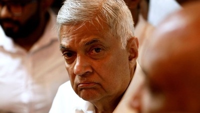 FILE PHOTO: Ranil Wickremesinghe, arrives at a Buddhist temple after his swearing-in ceremony, amid the country's economic crisis, in Colombo, Sri Lanka, &nbsp; (REUTERS)