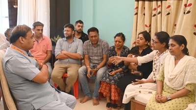 Assam chief minister Himanta Biswa Sarma interacts with the family of businessman and animal activist Vineet Bagaria. (@himantabiswa/Twitter)
