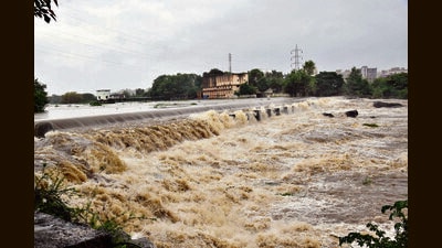 Due to incessant rains in Maval area, the water level of Pavana River has risen and a large amount of water is flowing from Ravet-Punawale bandhara. (HT PHOTO) Due to incessant rains in Maval area, the water level of Pavana River has risen and a large amount of water is flowing from Ravet-Punawale bandhara. (HT PHOTO)