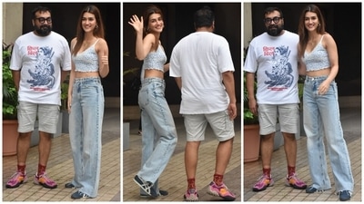 On Saturday, Kriti Sanon stepped out in Mumbai dressed in a cropped tank top and high-rise denim jeans. The paparazzi clicked her with Anurag Kashyap during the outing. The pictures also show her posing for the cameras and flashing her pretty smile. (HT Photo/Varinder Chawla) On Saturday, Kriti Sanon stepped out in Mumbai dressed in a cropped tank top and high-rise denim jeans. The paparazzi clicked her with Anurag Kashyap during the outing. The pictures also show her posing for the cameras and flashing her pretty smile. (HT Photo/Varinder Chawla)