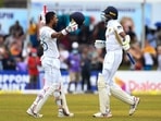 Dinesh Chandimal celebrates with teammate Kasun Rajitha after scoring 200 on Day 4 of the second Test between Sri Lanka and Australia(AFP) Dinesh Chandimal celebrates with teammate Kasun Rajitha after scoring 200 on Day 4 of the second Test between Sri Lanka and Australia(AFP)