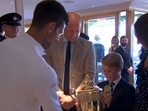 Novak Djokovic with Prince William, Kate Middleton and son George