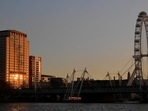 The London Eye wheel is seen at sunset, amid the outbreak of the coronavirus disease on the first day of a newly imposed lockdown, in London, Britain. The London Eye wheel is seen at sunset, amid the outbreak of the coronavirus disease on the first day of a newly imposed lockdown, in London, Britain.