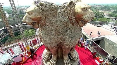 A 6.5m long bronze National Emblem cast unveiled by the Prime Minister Narendra Modi on the roof of the New Parliament Building, in New Delhi. (ANI) A 6.5m long bronze National Emblem cast unveiled by the Prime Minister Narendra Modi on the roof of the New Parliament Building, in New Delhi. (ANI)
