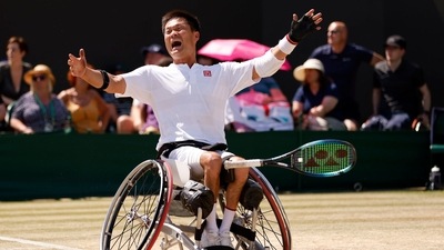 Shingo Kunieda of Japan celebrates after beating Britain's Alfie Hewett to win the final of the men's wheelchair singles. (AP)