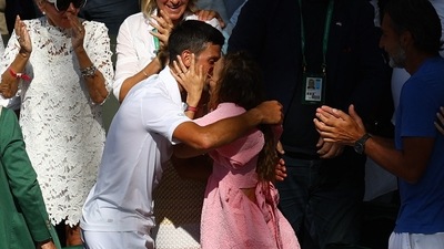 Novak Djokovic celebrates with wife Jelena Djokovic in the stands after winning the men's singles Wimbledon final. (REUTERS)