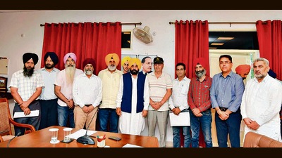 Members of the Public Action Committee with chief minister Bhagwant Mann (centre) in Chandigarh on Monday. (HT Photo) Members of the Public Action Committee with chief minister Bhagwant Mann (centre) in Chandigarh on Monday. (HT Photo)