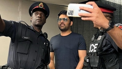 Kapil Sharma poses with Canada Police during his tour. Kapil Sharma poses with Canada Police during his tour.