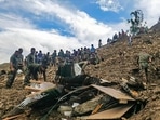 Rescue operations underway after a massive landslide hit the Tupul railway construction camp in Noney district of Manipur. (PTI) Rescue operations underway after a massive landslide hit the Tupul railway construction camp in Noney district of Manipur. (PTI)