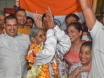 Bhagwani Devi Dagar dances as her relatives and family members applaud, after her arrival at IGI Airport in Delhi,(PTI) Bhagwani Devi Dagar dances as her relatives and family members applaud, after her arrival at IGI Airport in Delhi,(PTI)