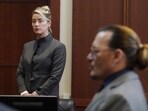 Actors Amber Heard and Johnny Depp during the defamation trial at the Fairfax County Circuit Courthouse in May. (AP)(AP)