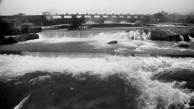 Water released from Khadakwasala dam in Mutha river in Pune, on Tuesday. Pune receives 165.7 mm rainfall. (HT PHOTO) Water released from Khadakwasala dam in Mutha river in Pune, on Tuesday. Pune receives 165.7 mm rainfall. (HT PHOTO)