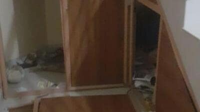 The window panes and gate of the office were damaged in the attack (ANI)