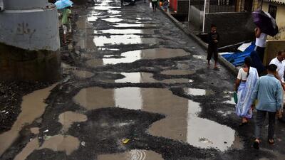 The condition of the service road behind Jogeshwari police station in Mumbai on Tuesday. Vijay Bate/HT Photo The condition of the service road behind Jogeshwari police station in Mumbai on Tuesday. Vijay Bate/HT Photo