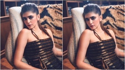 Sanjana's dress featured stripes in golden and black shades alternately. The knee-length bodycon dress came with slip in sleeves and knot details at the sides. (Instagram/@sanjanasanghi96)