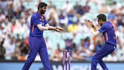 Jasprit Bumrah celebrates with Yuzvendra Chahal after the dismissal of Jason Roy (AP) Jasprit Bumrah celebrates with Yuzvendra Chahal after the dismissal of Jason Roy (AP)
