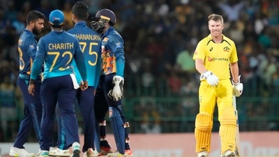 David Warner smiles as he walks on the ground (AP) David Warner smiles as he walks on the ground (AP)