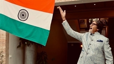 Amitabh Bachchan with the national flag. Amitabh Bachchan with the national flag.