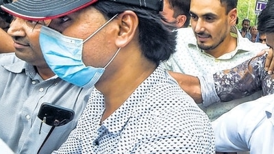 AltNews co-founder Muhammad Zubair being taken to the Patiala House Courts, following his arrest by special cell of Delhi Police. (PTI Photo/Ravi Choudhary) AltNews co-founder Muhammad Zubair being taken to the Patiala House Courts, following his arrest by special cell of Delhi Police. (PTI Photo/Ravi Choudhary)