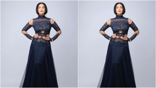 Sunny’s laced blue gown came intricately embroidered in blue threads and nude fabric. The gown featured turtleneck details and cascaded into tulle fabric below the waist.(Instagram/@sunnyleone)