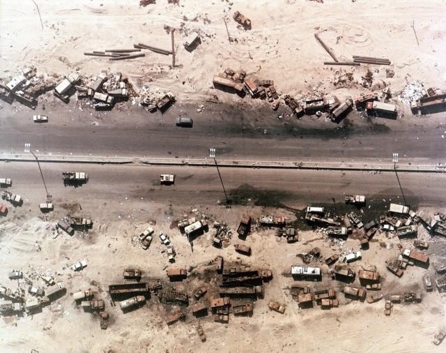 Aerial view of destroyed Iraqi vehicles beside Highway 80, west of Kuwait City. The ‘Highway of Death ‘ was bombed by coalition forces on February 27-28 1991 during Gulf War 1. (Shutterstock) Aerial view of destroyed Iraqi vehicles beside Highway 80, west of Kuwait City. The ‘Highway of Death ‘ was bombed by coalition forces on February 27-28 1991 during Gulf War 1. (Shutterstock)
