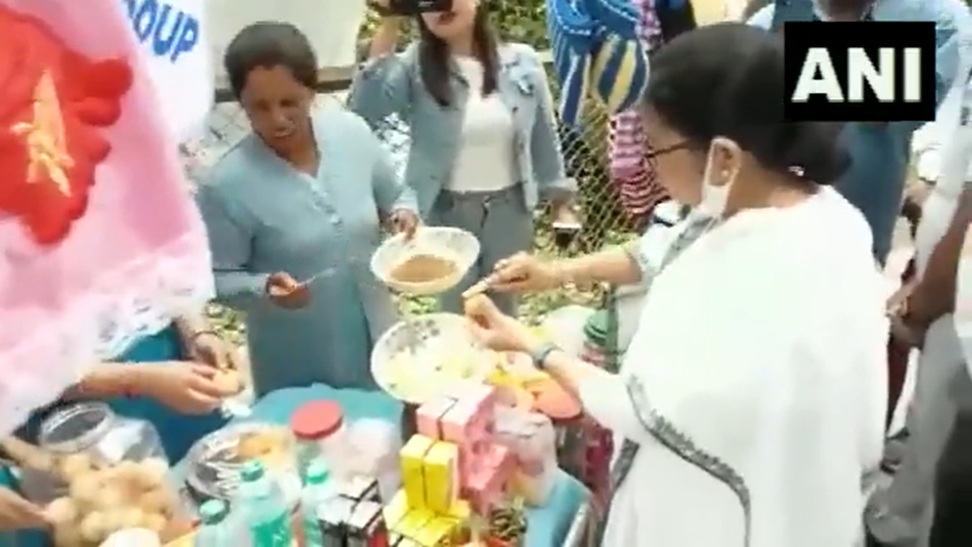 West Bengal chief minister and TMC supremo Mamata Banerjee serves ‘phuchka’ (panipuri) at a stall in Darjeeling on Tuesday. (Screengrab/ANI video)