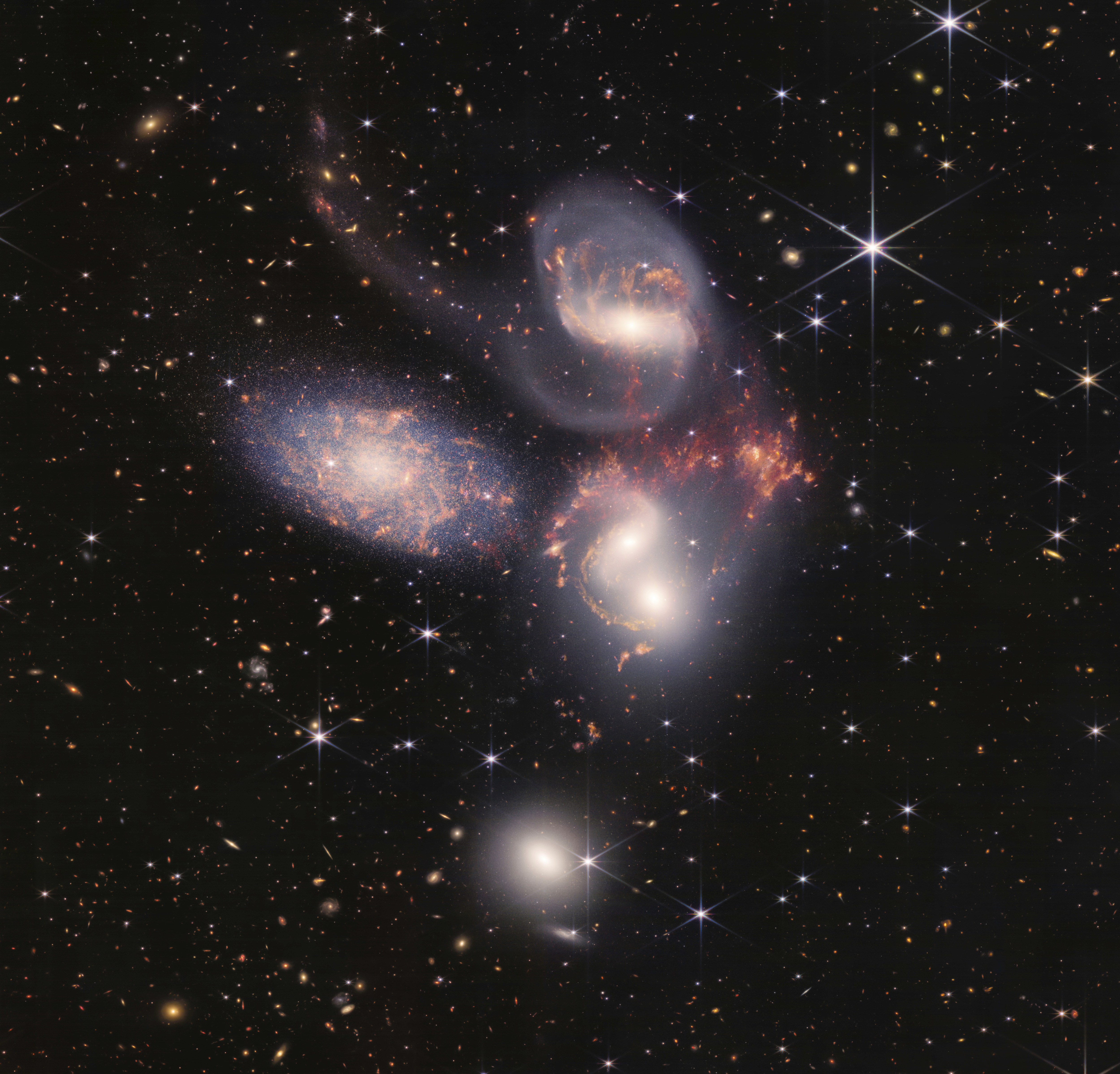 This image shows Stephan's Quintet, a visual grouping of five galaxies, as observed from the Webb Telescope. This mosaic was constructed from almost 1,000 separate image files.(NASA) This image shows Stephan's Quintet, a visual grouping of five galaxies, as observed from the Webb Telescope. This mosaic was constructed from almost 1,000 separate image files.(NASA)