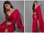 Mouni Roy has lately been making headlines for her role in the film Brahmastra. The graceful Mouni also keeps garnering praises for her praise-worthy outfits. From red carpet wears to traditional fits, the Gold actor can pull out any look effortlessly. In her latest Instagram photos, she can be seen grabbing eyeballs in a red embellished.(Instagram/@imouniroy)