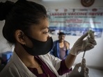 A nurse prepares to administer vaccine for COVID-19 at a private vaccination centre&nbsp;