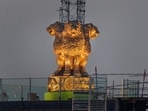 Newly unveiled National Emblem cast made of bronze on the roof of new Parliament House building, in New Delhi.(PTI) Newly unveiled National Emblem cast made of bronze on the roof of new Parliament House building, in New Delhi.(PTI)