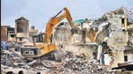 A bulldozer being used to demolish the ‘illegally constructed’ house of an accused in Prayagraj violence in June. (PTI) A bulldozer being used to demolish the ‘illegally constructed’ house of an accused in Prayagraj violence in June. (PTI)