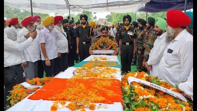Army jawan Kuldeep Singh, 29, who died reportedly due to heart attack during duty at the Indo-China Border in Ladakh on Monday, was cremated with military honours at his native Lauhuke Kalan village in Zira block of Ferozepur on Wednesday.