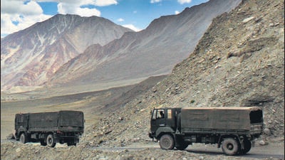 Indian Army trucks at Pangong Tso lake near the India-China border in Ladakh area. (AP File Photo) Indian Army trucks at Pangong Tso lake near the India-China border in Ladakh area. (AP File Photo)