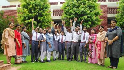 School for the Deaf Children students in a jubilant mood after the declaration of result in Ludhiana. (HT PHOTO)