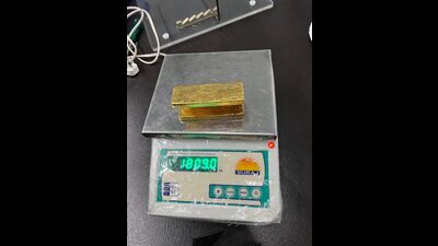 The U-shaped gold bar was affixed under a passenger seat using a Velcro strap. (HT Photo)