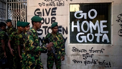 Sri Lanka army soldiers patrol near the official residence of president Gotabaya Rajapaksa days after it was stormed by anti government protesters in Colombo. (AP) Sri Lanka army soldiers patrol near the official residence of president Gotabaya Rajapaksa days after it was stormed by anti government protesters in Colombo. (AP)
