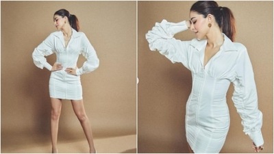 Ananya Panday grabs eye balls in a short white bustier collared dress.&nbsp; (Instagram/@ananyapanday)