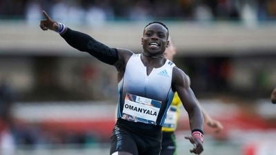 Ferdinand Omanyala celebrates winning a 100m race. (REUTERS)