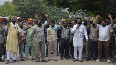PRTC employees’ union protesting against the state government at bus stand in Ludhiana. (Harvinder Singh/HT) PRTC employees’ union protesting against the state government at bus stand in Ludhiana. (Harvinder Singh/HT)