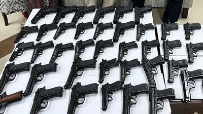 According to a customs official quoted by ANI, the couple also confessed to an earlier incident in which 25 guns were brought into India (Credit: ANI) According to a customs official quoted by ANI, the couple also confessed to an earlier incident in which 25 guns were brought into India (Credit: ANI)
