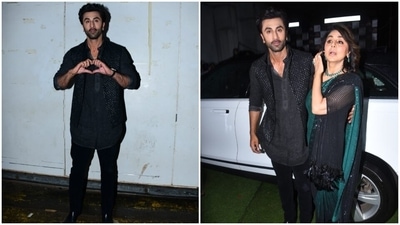 On Wednesday, Ranbir and Vaani promoted their film, Shamshera, on Dance Deewane Juniors. Ranbir's mother, Neetu Kapoor, who is also a judge on the dance reality TV show, posed for the paparazzi with Ranbir. The mother-son duo hugged each other while getting pictures clicked. Ranbir looked dapper in an all-black outfit featuring a short bandhgala kurta and matching pants. (HT Photo/Varinder Chawla)