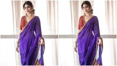 Rhea chose statement jewellery and soft glam pics to style her simply chic look. She picked ornate jhumkis adorned with charms and mirror work and stacked chunky bracelets for the accessories. (Instagram)