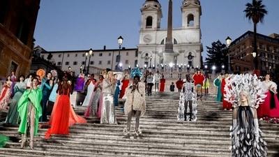Dior withdraws Valentino compensation demand of 100,000 euros for blocking access to its Rome store (Reuters) Dior withdraws Valentino compensation demand of 100,000 euros for blocking access to its Rome store (Reuters)